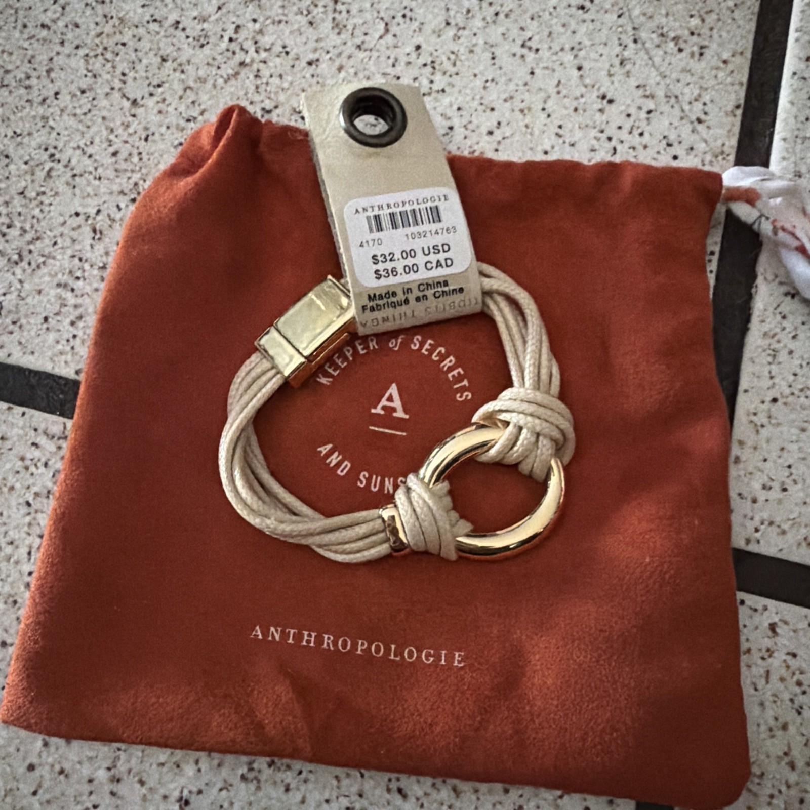 ANTHROPOLOGIE Faux Leather Knot Hardware Bracelet in Cream – One Size