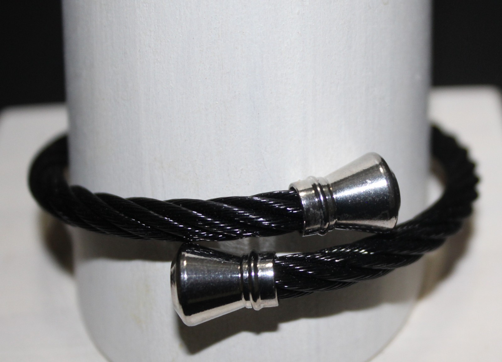 Black or Silver over Stainless Twisted Bracelet-Silver Encaps – Fits All Wrists