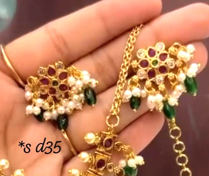 Gold-plated guttapusalu choker set ruby emerald and white stone with pearl drops