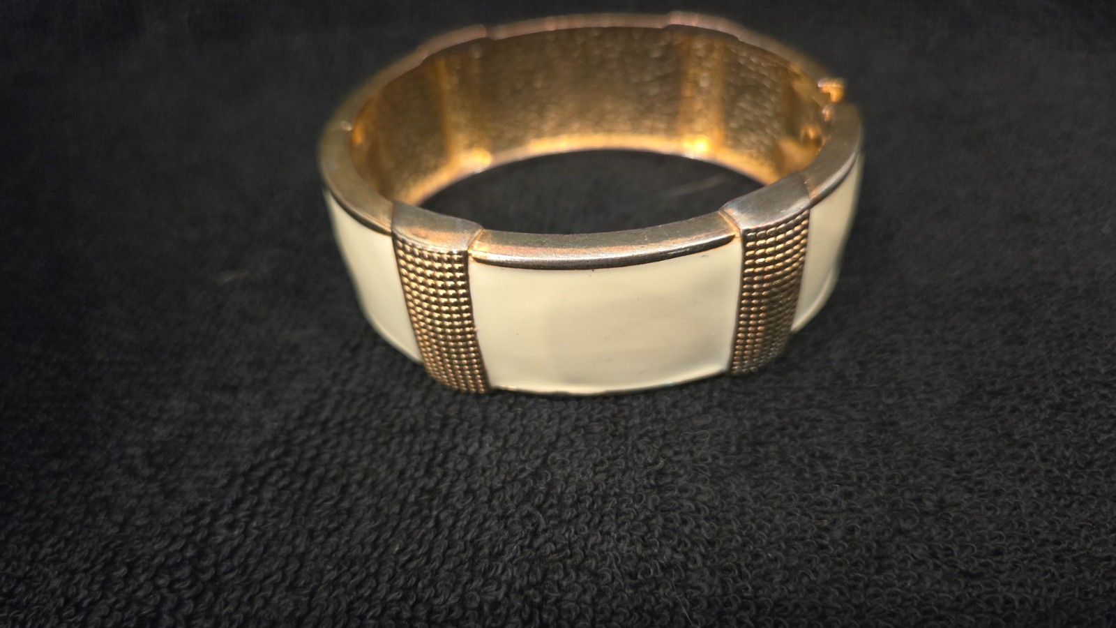 Off white and gold tone retractable, good condition