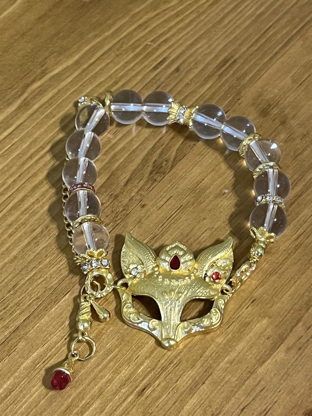 Spirit fox mask design stretch bracelet gold tone chain clear beads dangle charm
