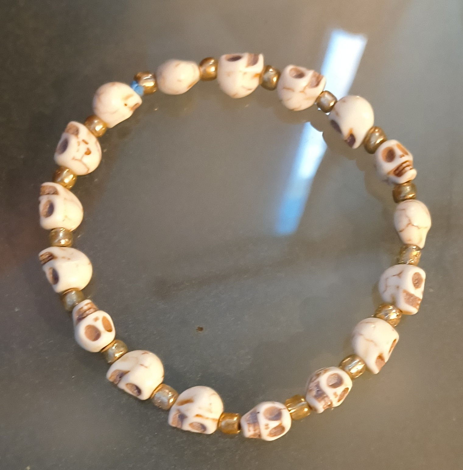 White Skull Beaded Stretch Bracelet, Gold-Tone Spacers, Skeletons & Skulls