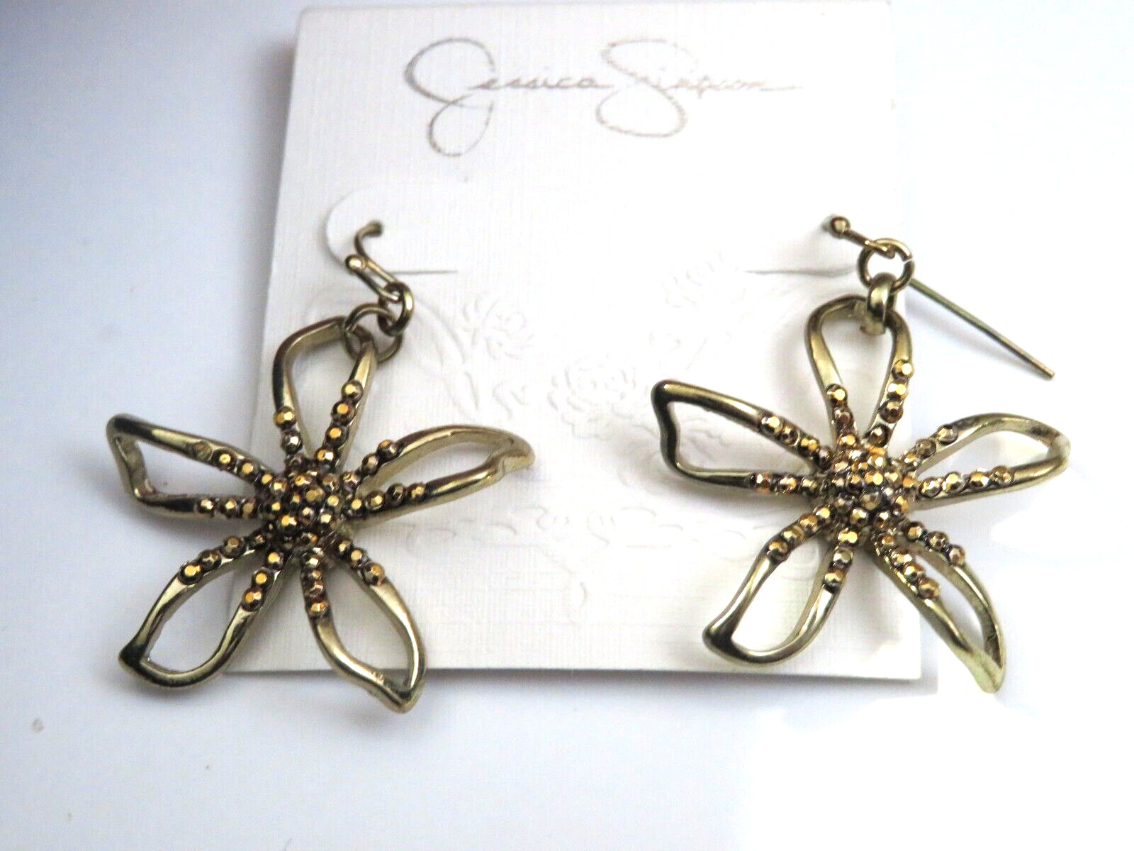 JESSICA SIMPSON SILLOUETTE FLOWER EARRINGS HOOKS