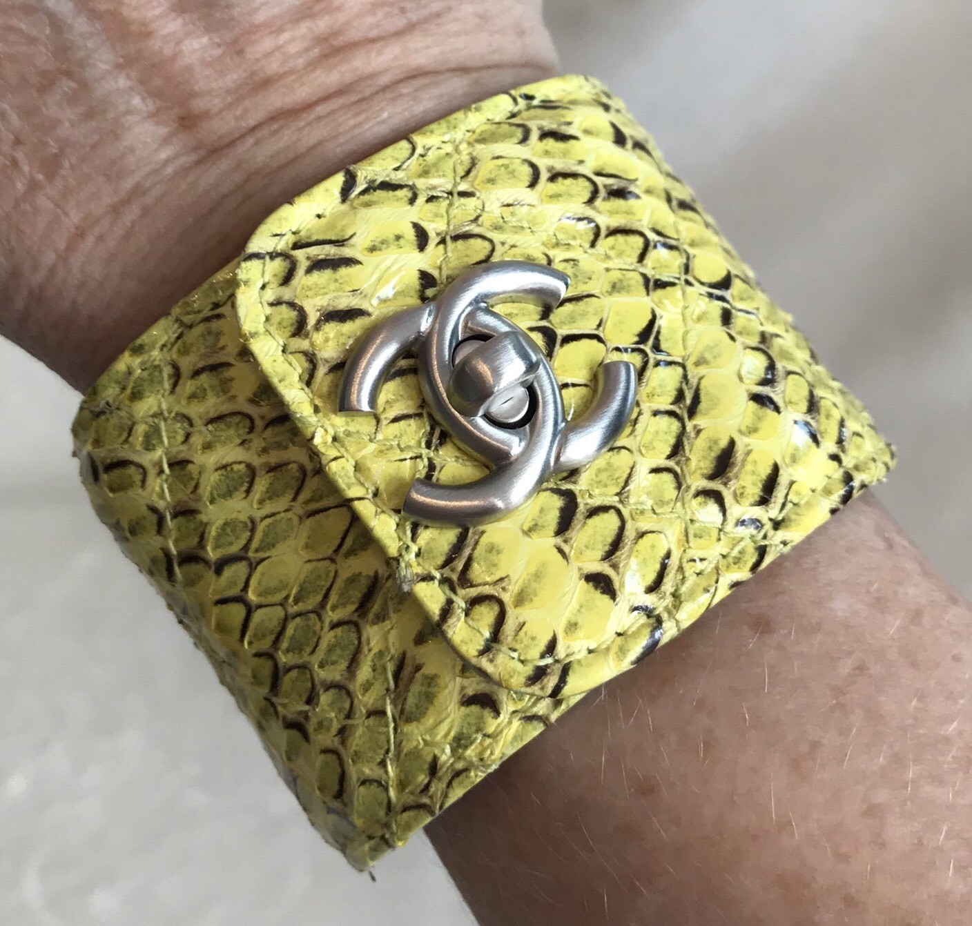 NIB CHANEL Yellow Black Python, Silver CC LOGO CUFF BRACELET, MEDIUM, 7.5”