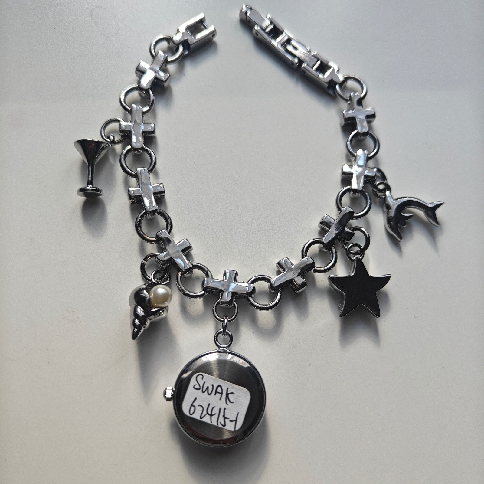 Anne Klein Silver Tone Beachy Charm Bracelet Watch Dolphin Starfish Seashell