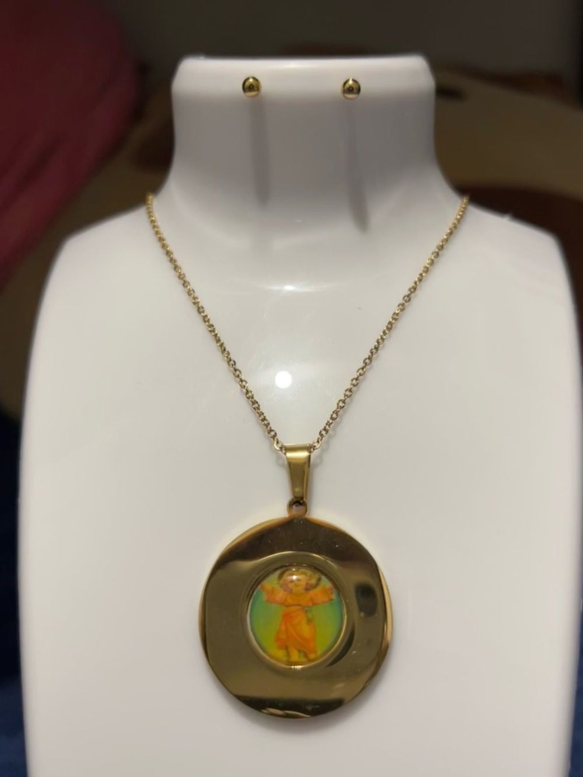 Gold Tone Round Pendant Necklace with Orange Accent