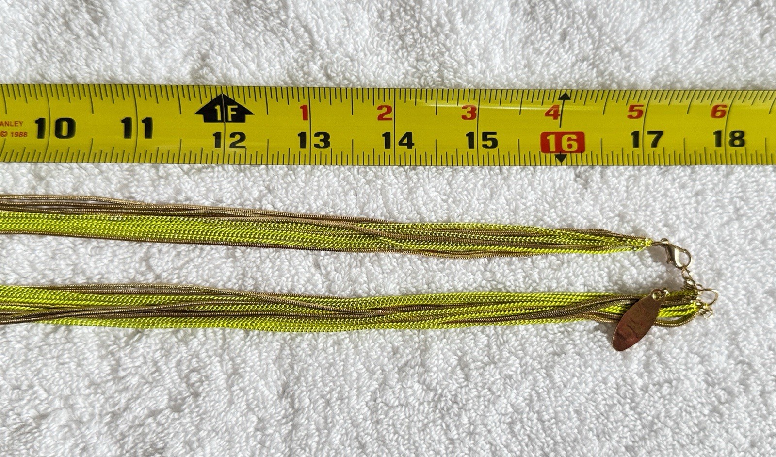 Gold Green Multi Chain Necklace by Cara NY. Lobster Claw Clasp 35”.