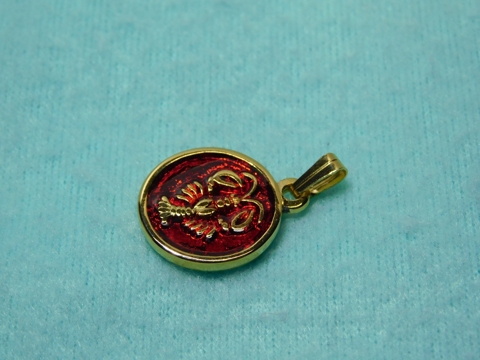 H.Stern 3/4″ Red (zodiac) Cancer Pendant in Very Good Cond.