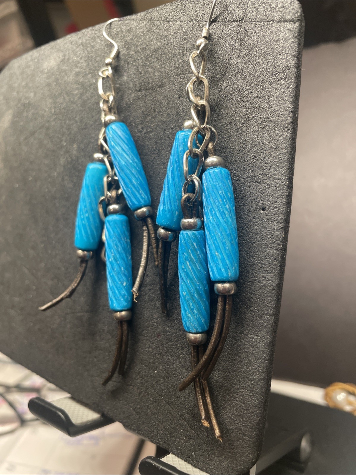 Etched Bone Beads Dangle On Leather