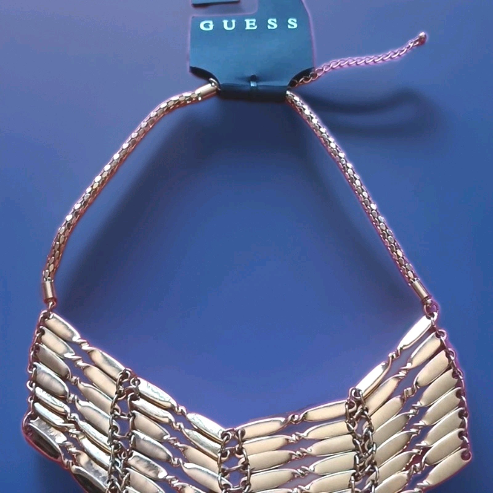 GUESS Gold Tone Bib Statement Necklace V Pendant Adjustable Cable Chain