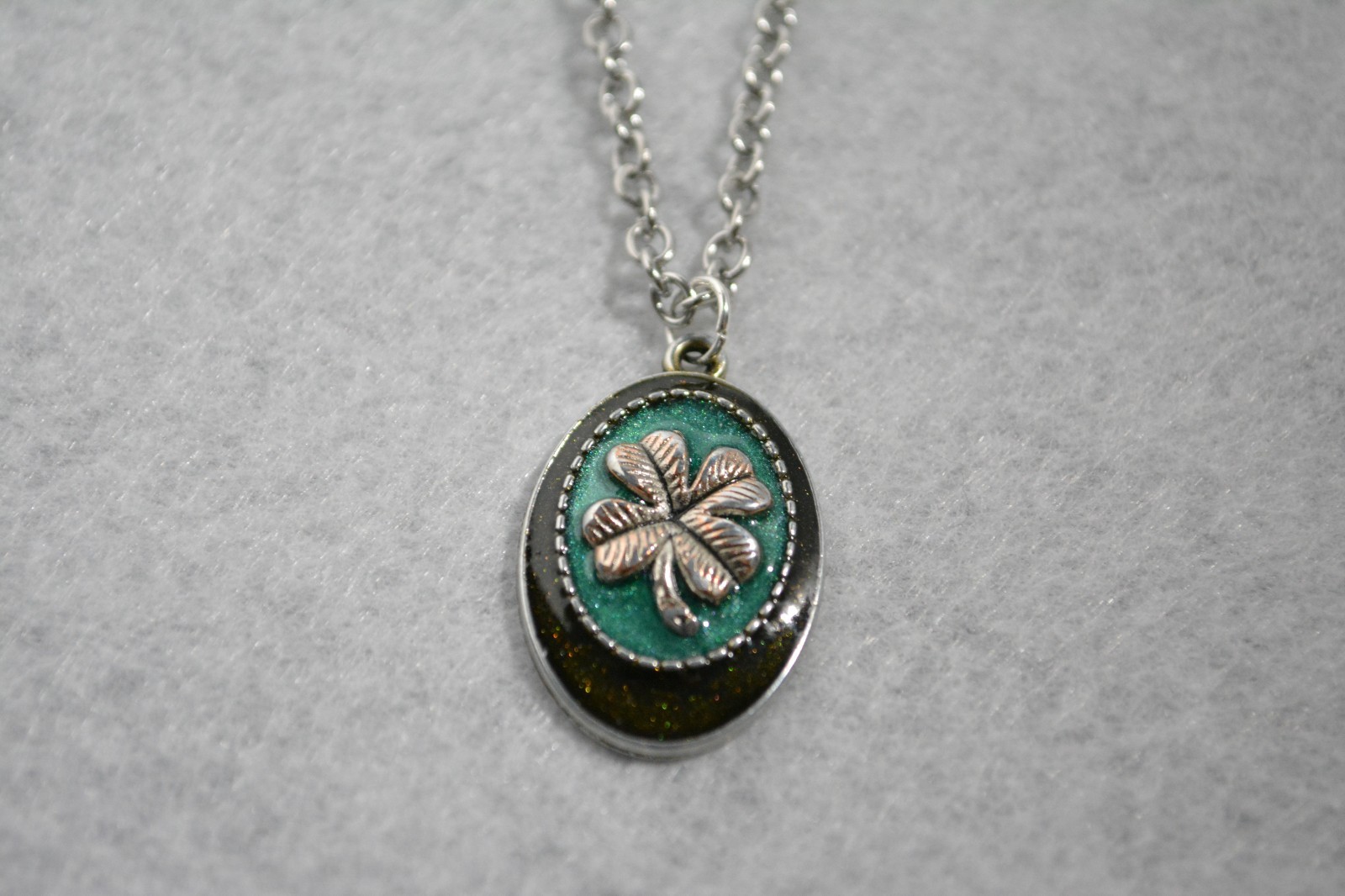 Four-leaf Clover Necklace With a Green Enamel Background.