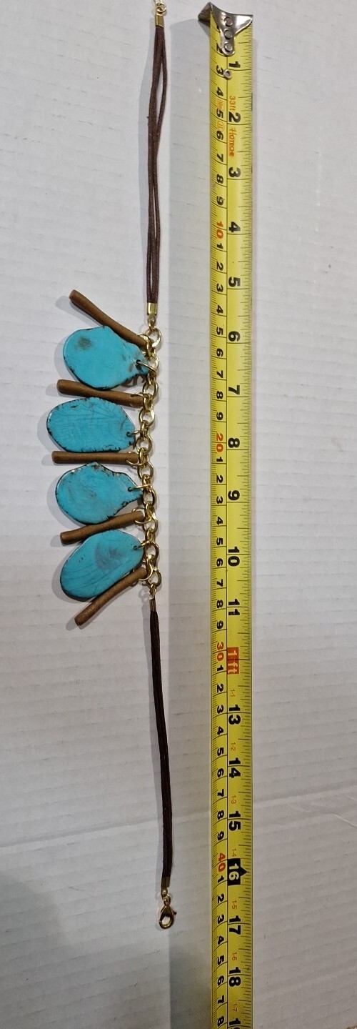 ladies turquoise Necklace On Gold And Leather Can Be 16 Ins To 20 Ins Long