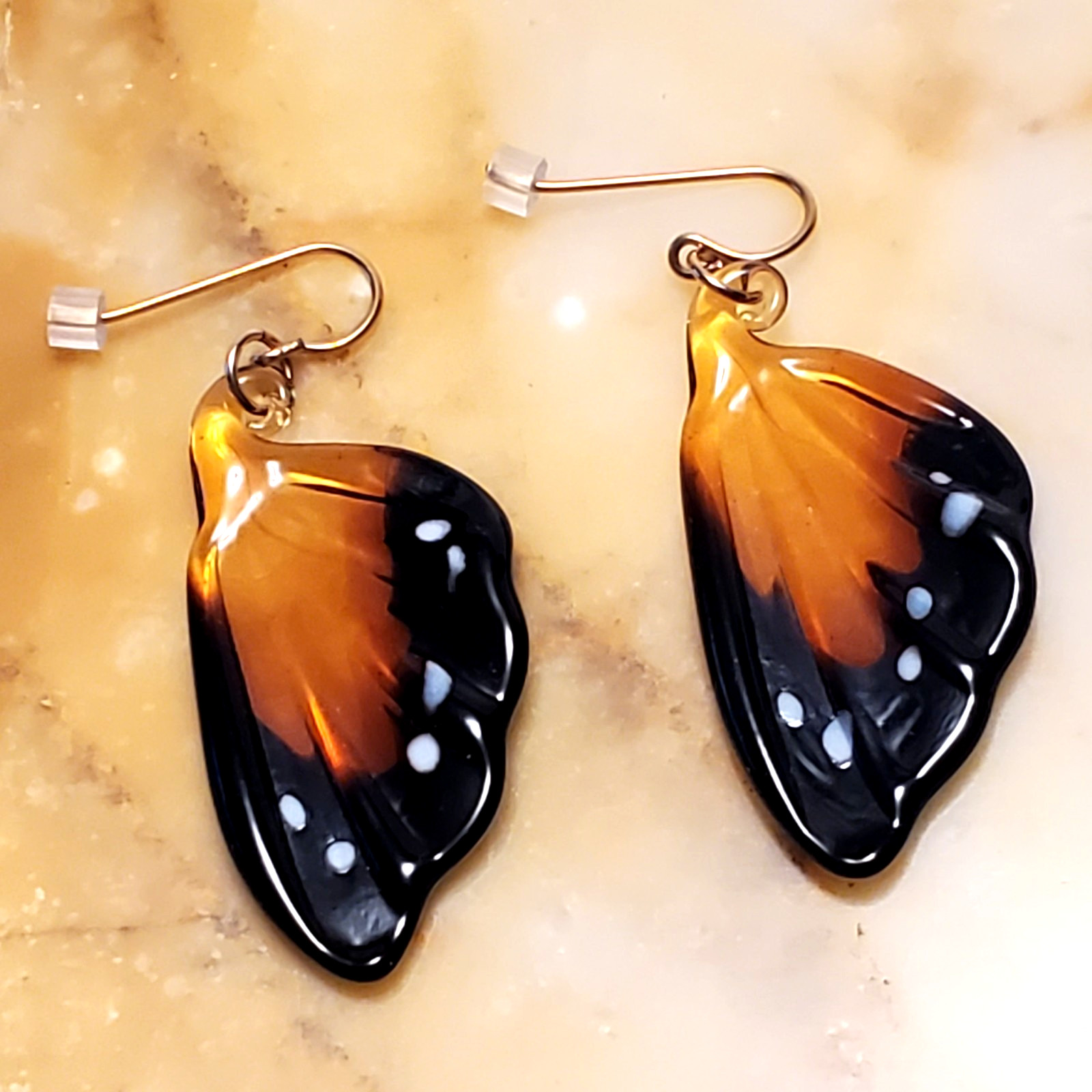 butterfly wing dangle earrings costume jewelry plastic resin brown white spots