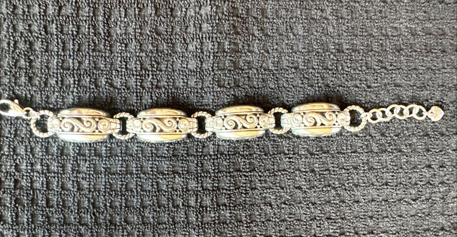 Brighton silver scroll link bracelet, ornate swirl designs and clear crystals.