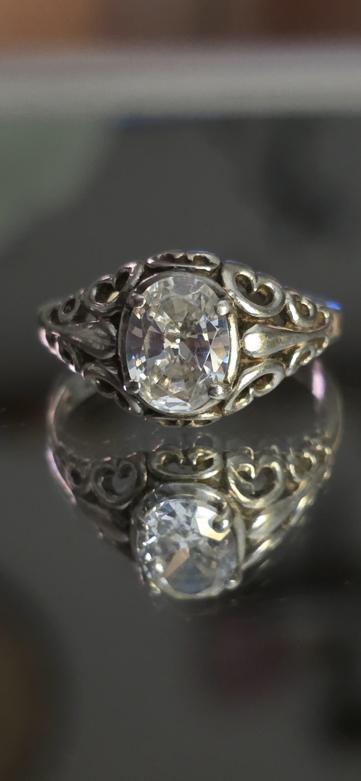 Vintage Kabana Sterling Silver Filigree Ring featuring a prominent round-cut cen