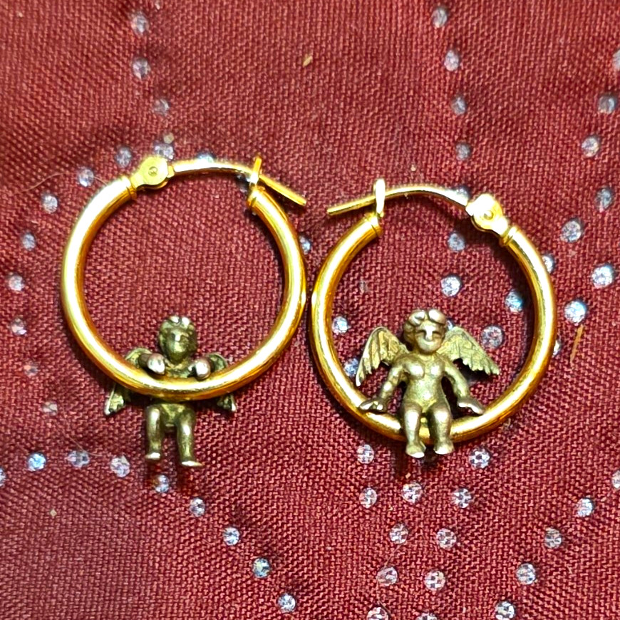 These earrings are vintage Jacmel JCM 14K yellow gold hoops with sterling angels