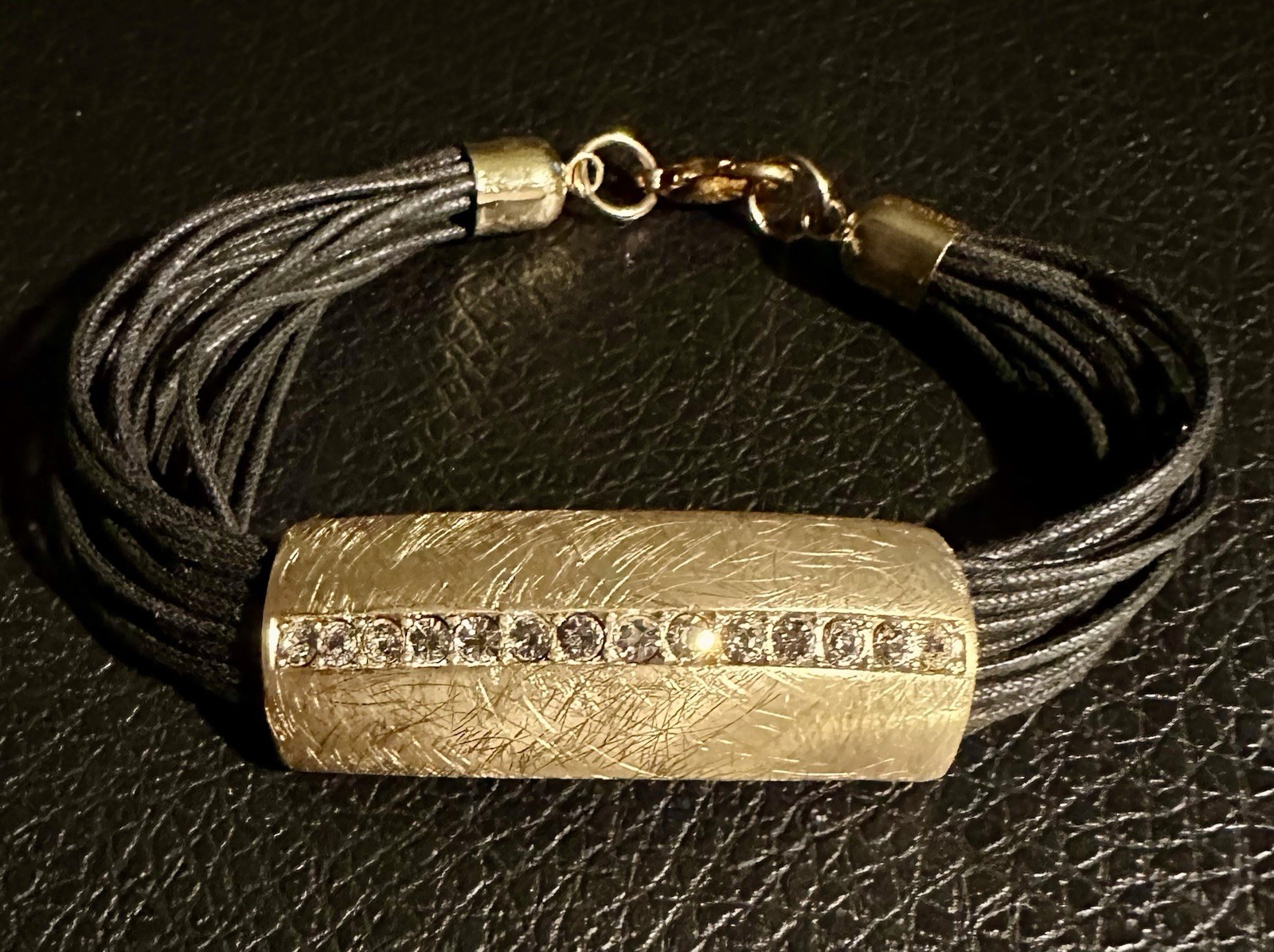 multi-strand black cord bracelet