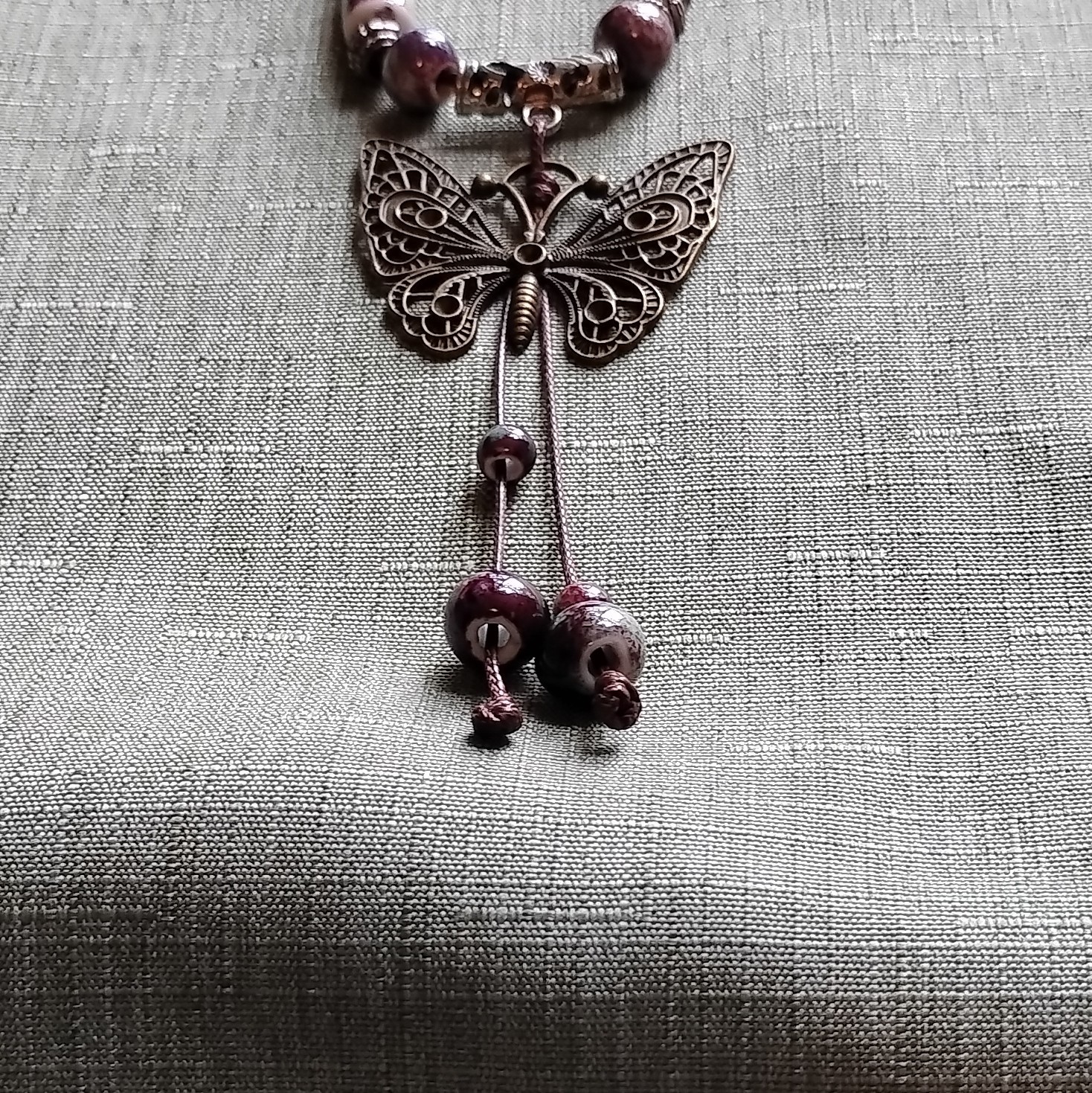Purple Glass Beaded Cord Necklace Butterfly Charm. 3099
