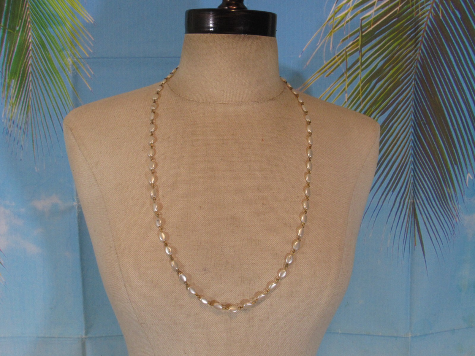 Necklace with Flat White Oval Beads Linked Together 30″