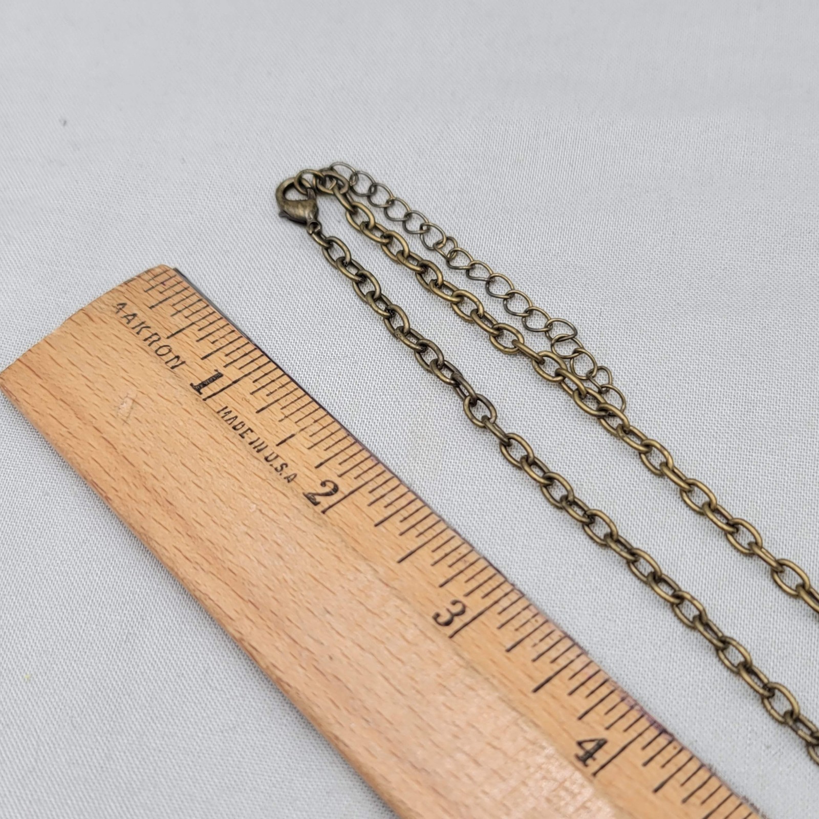 Embossed Metal Bird White Bead Necklace Bronze tone Chain 32″