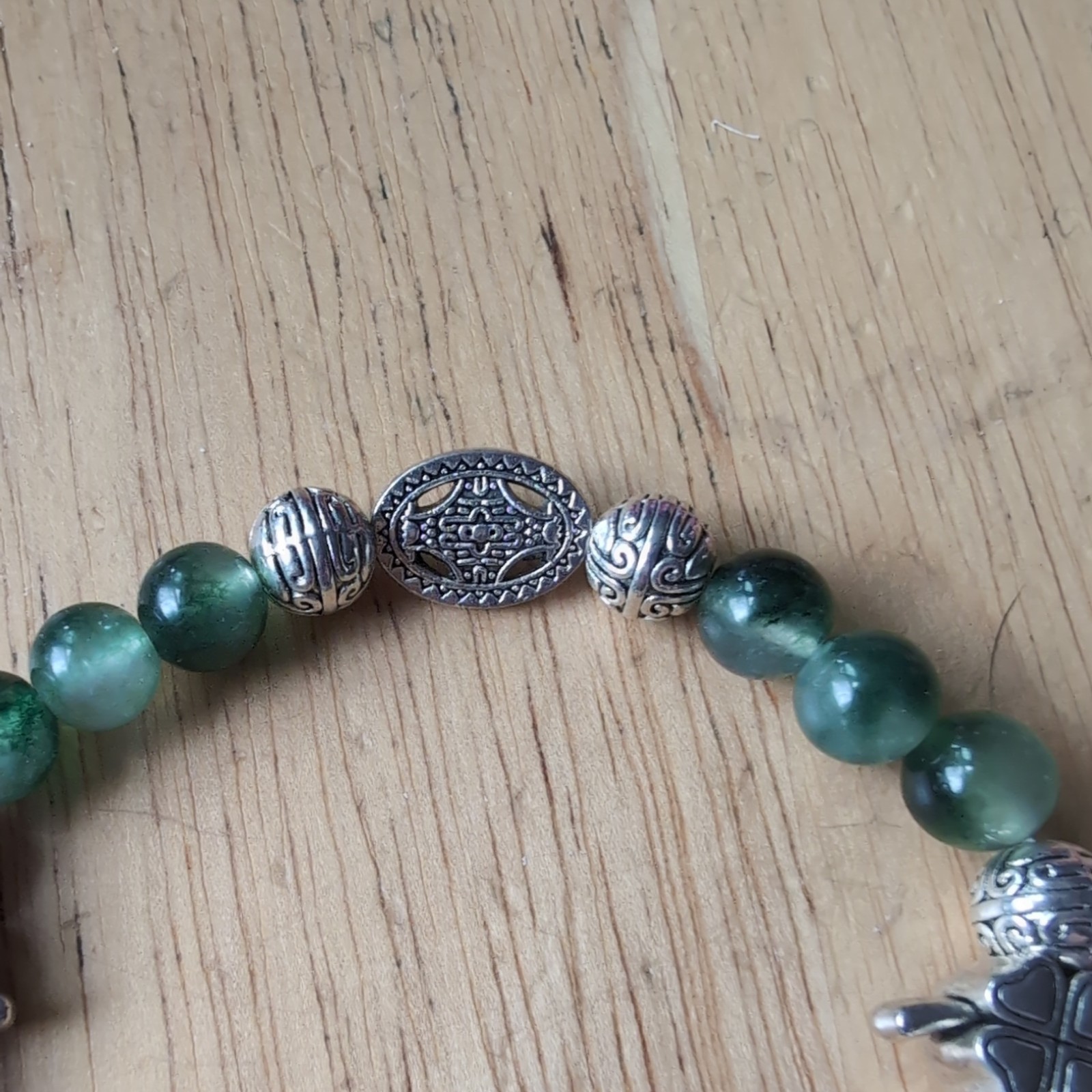 Hand Made Green And Silver Bracelet With Clover Charm