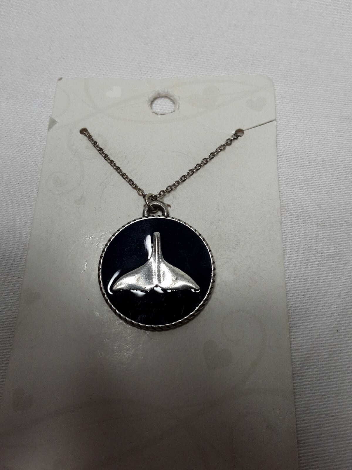 Whale fluke Silver Tone/navy Necklace on 18″ chain – New in pkg Very nice!