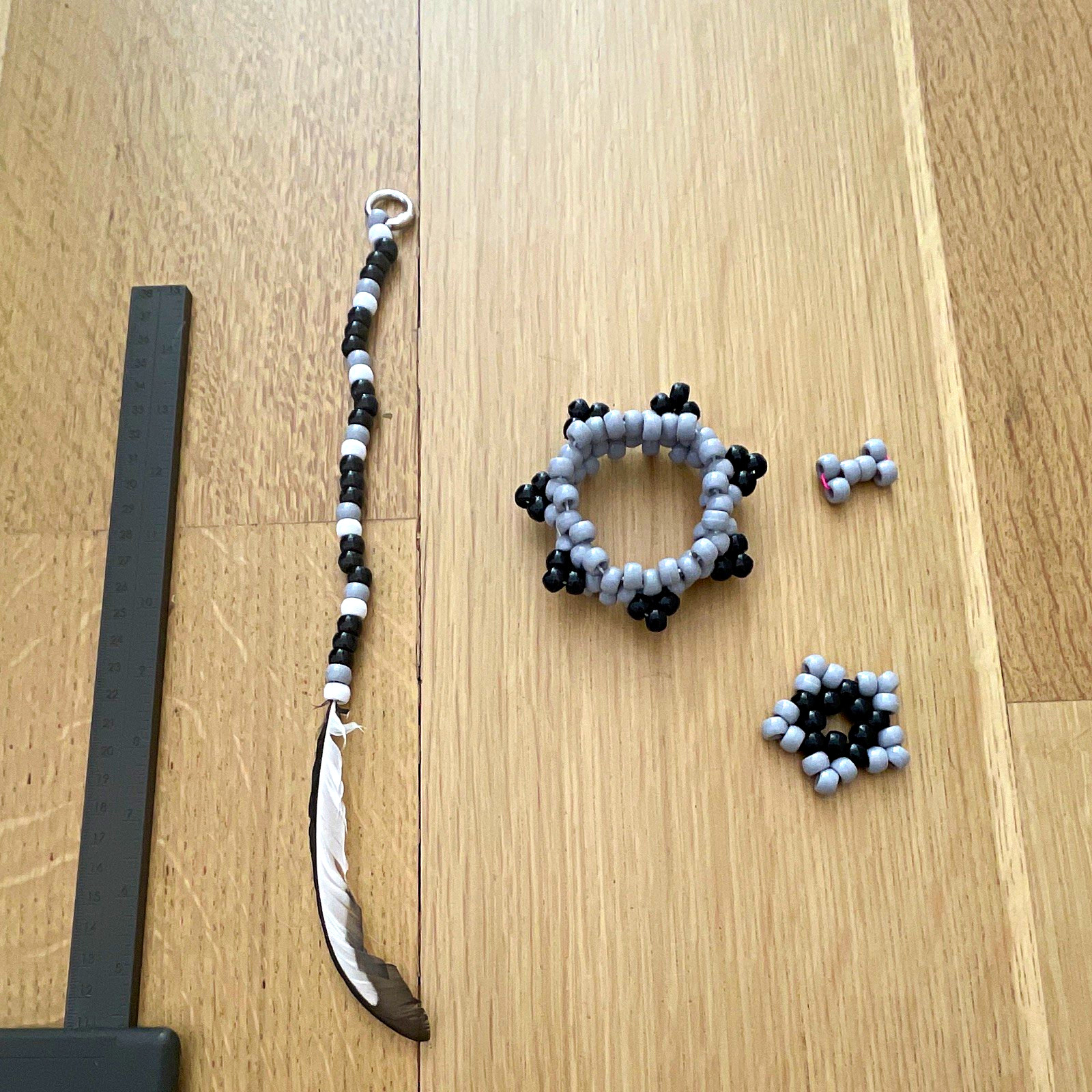 Kandi Black, grey, white set w/ spiked cuff, star, keychain feather, bone charm