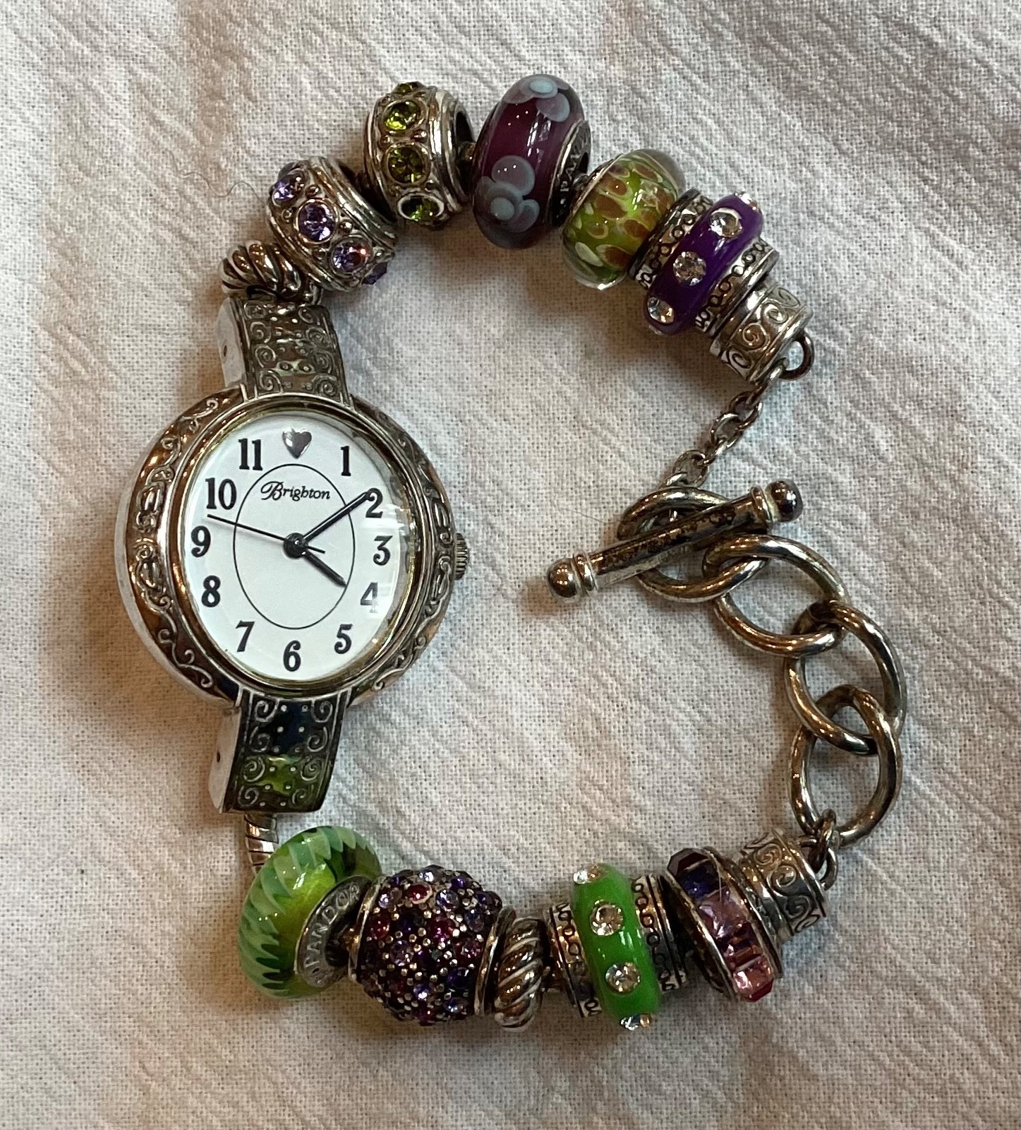 Brighton “Tustin” Silver Plated Watch with 11 Green and Purple Glass Beads