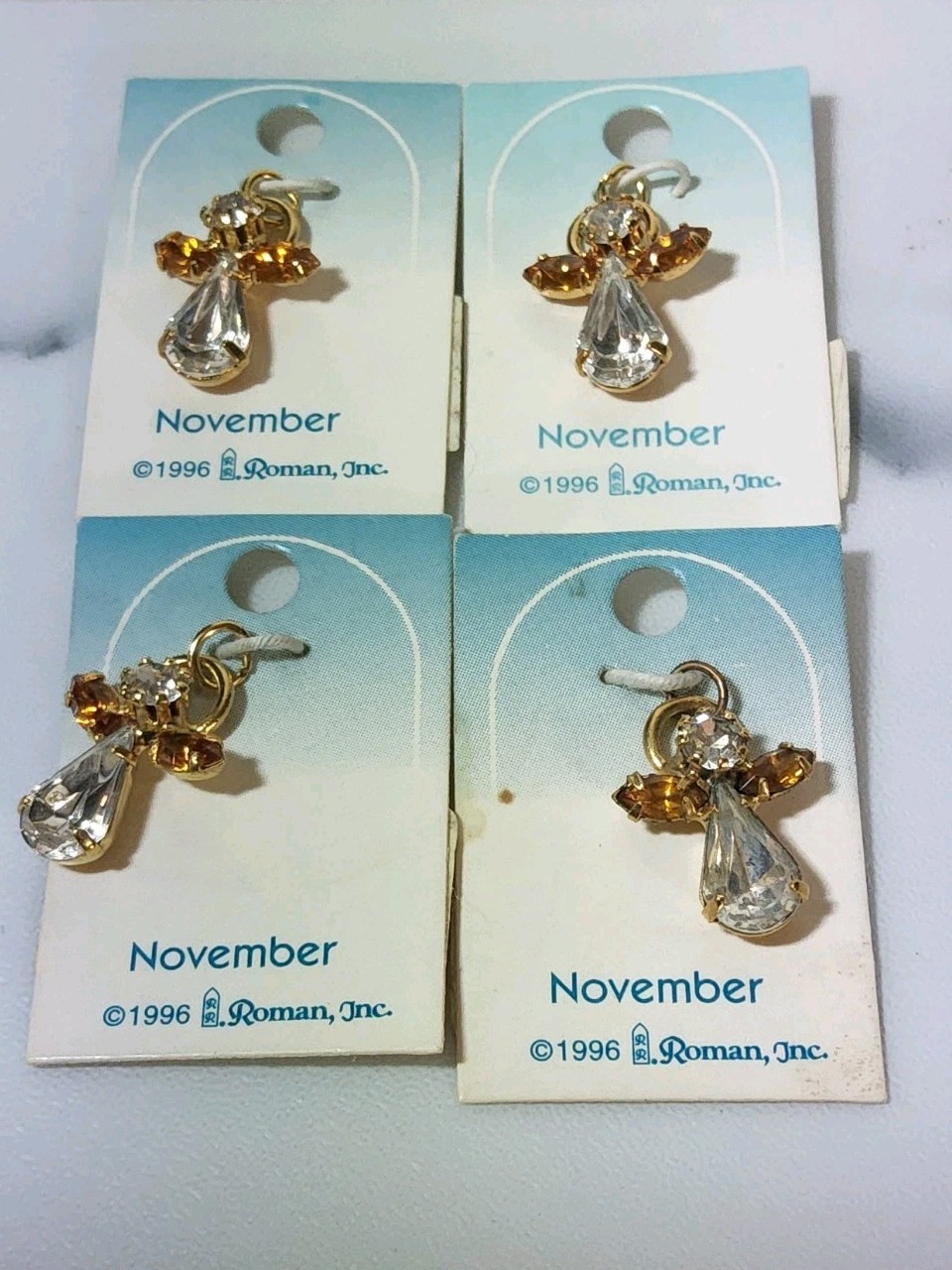 4 pc lot Vintage NOV Birthstone Angel Charm 1996 Roman Inc Pendant Religious