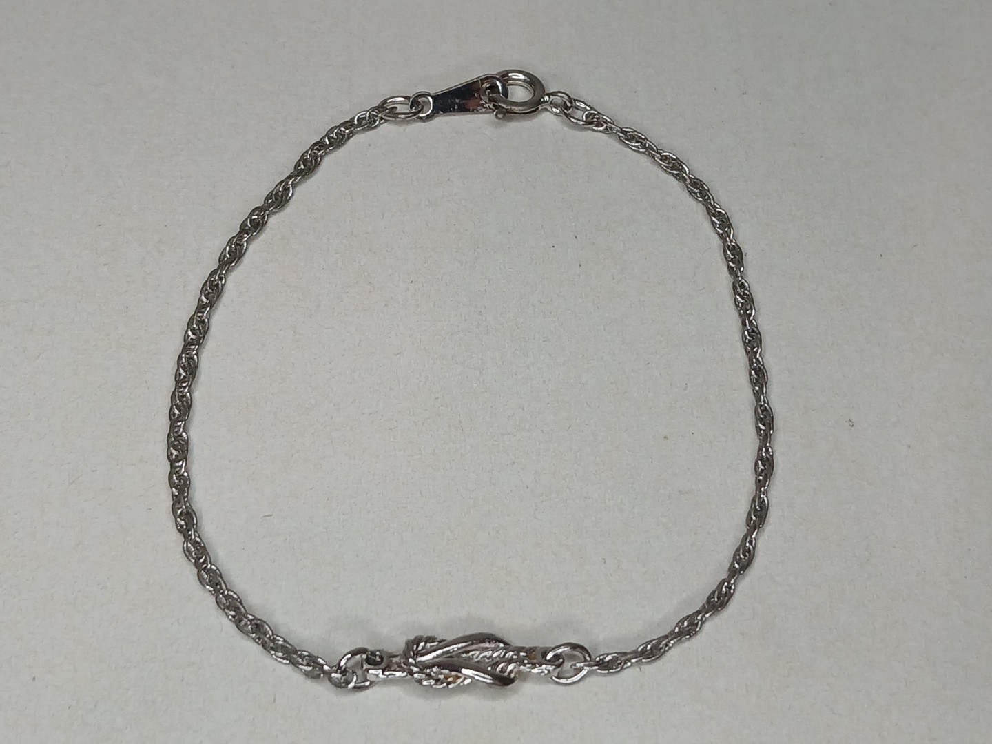 Vintage Avon Silver Tone Rope Knot Infinity Bracelet Signed Dainty 1.7 Grams