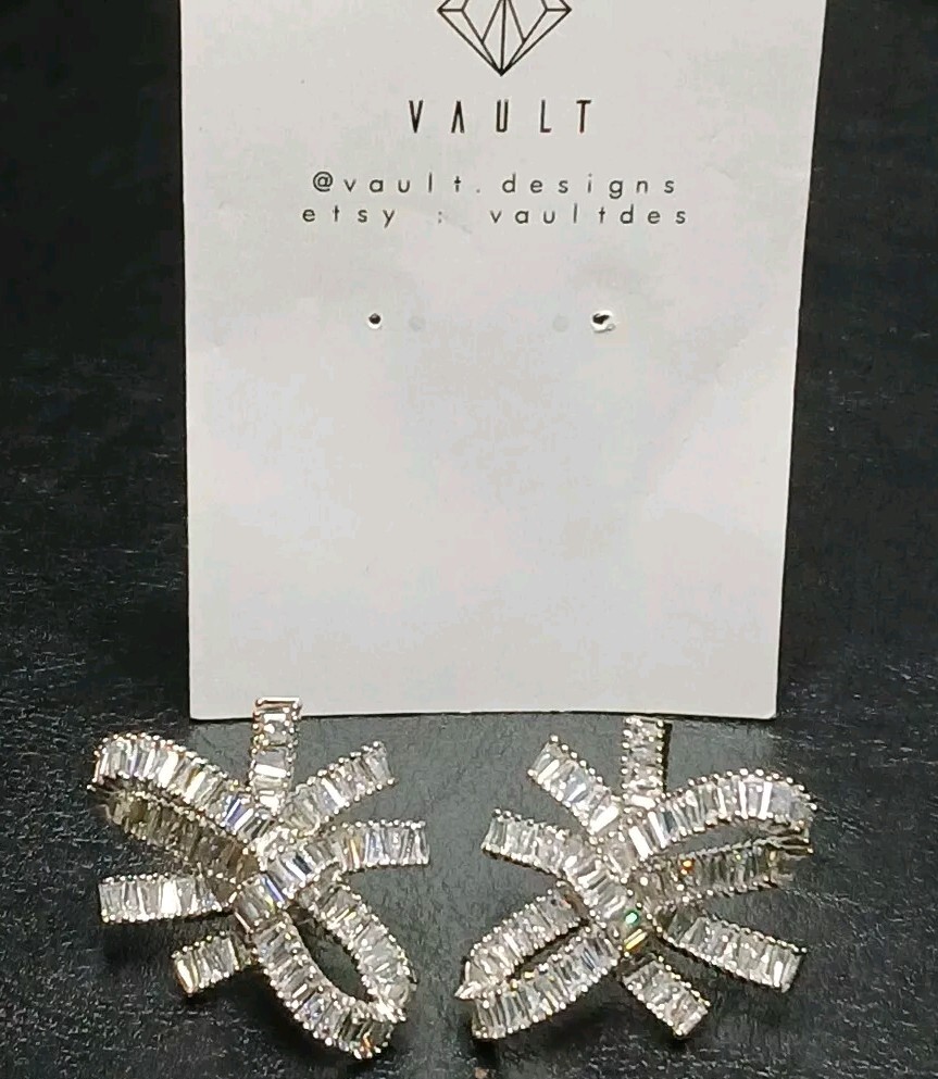 VAULT Pierced Earrings Bow Crystal Silver Tone. 1 1-646
