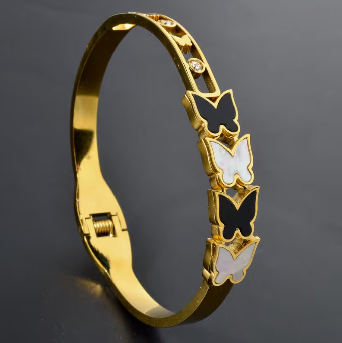 Exquisite Geometric Black and White Butterfly-Accented Stainless Steel Bracelet