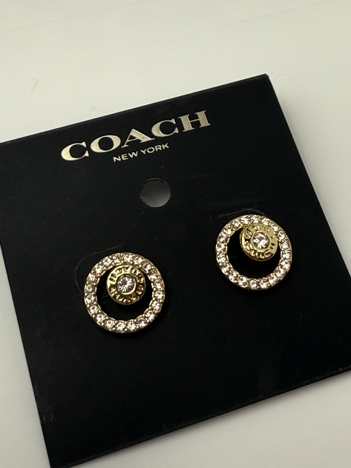 Coach Signature Open Circle Halo Gold Tone Pave Stone Stud Earrings F68009