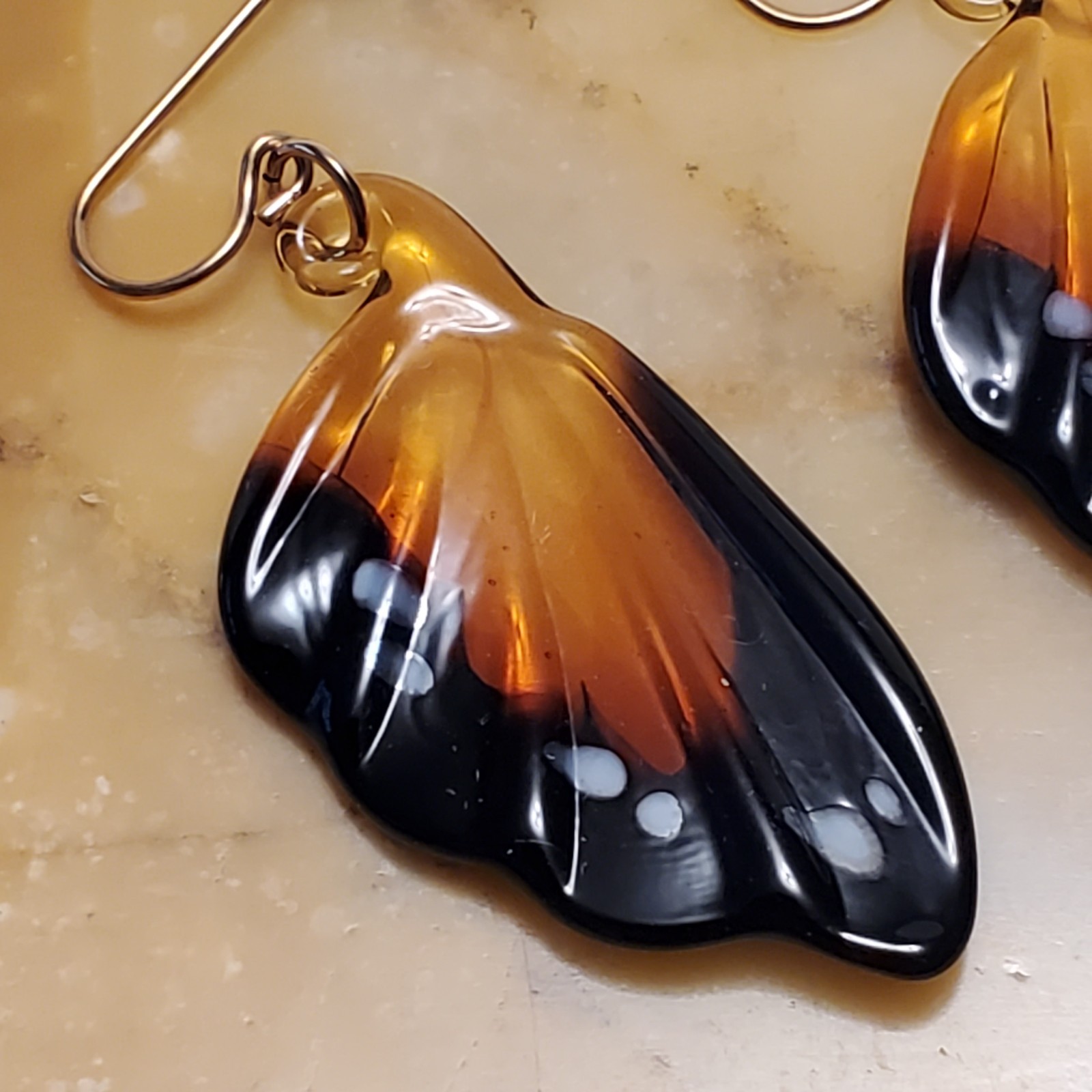butterfly wing dangle earrings costume jewelry plastic resin brown white spots
