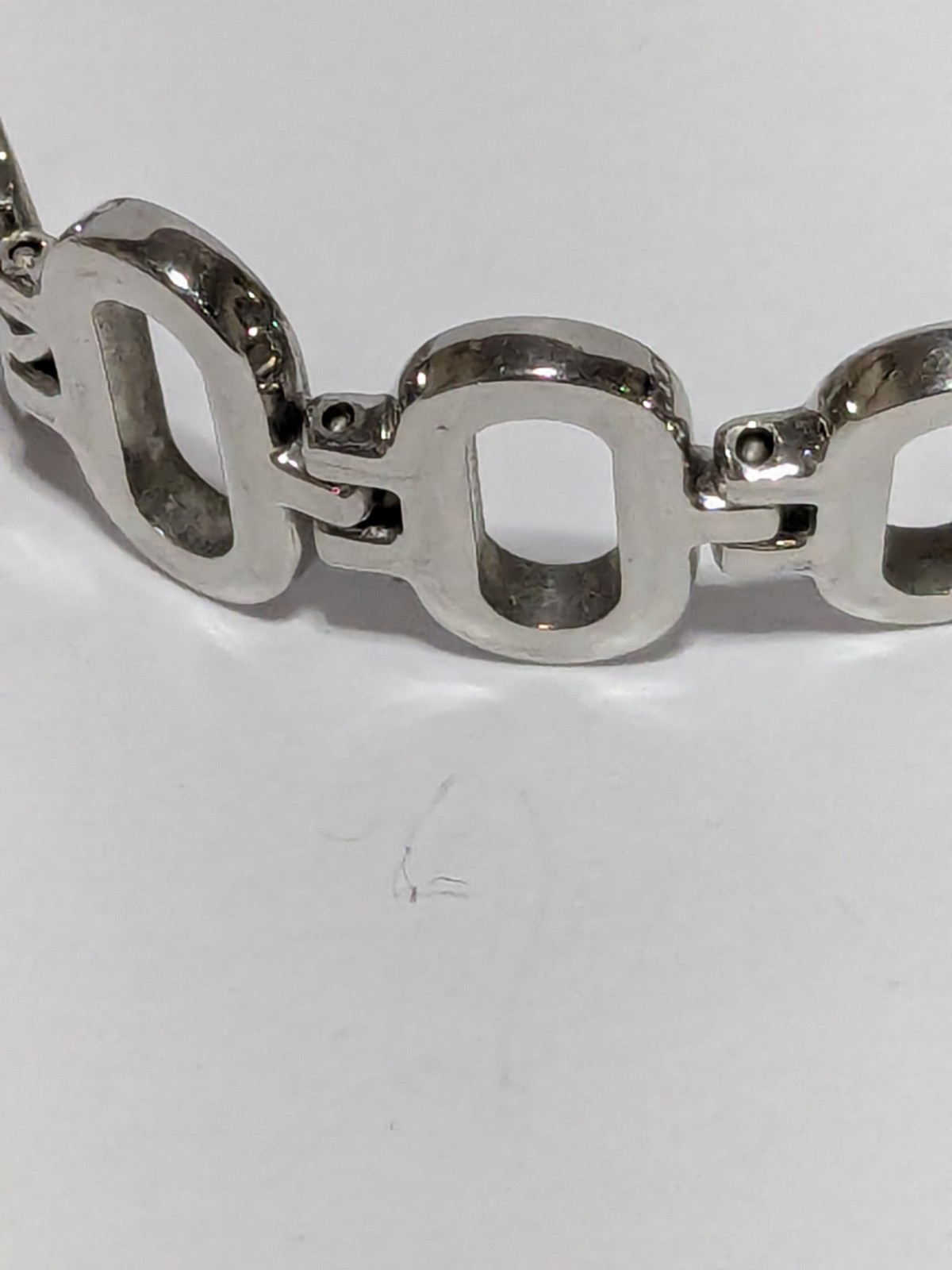 Maite Silver Tone Stainless Steel Oval Link Fold Over Clasp Bracelet 7.75″