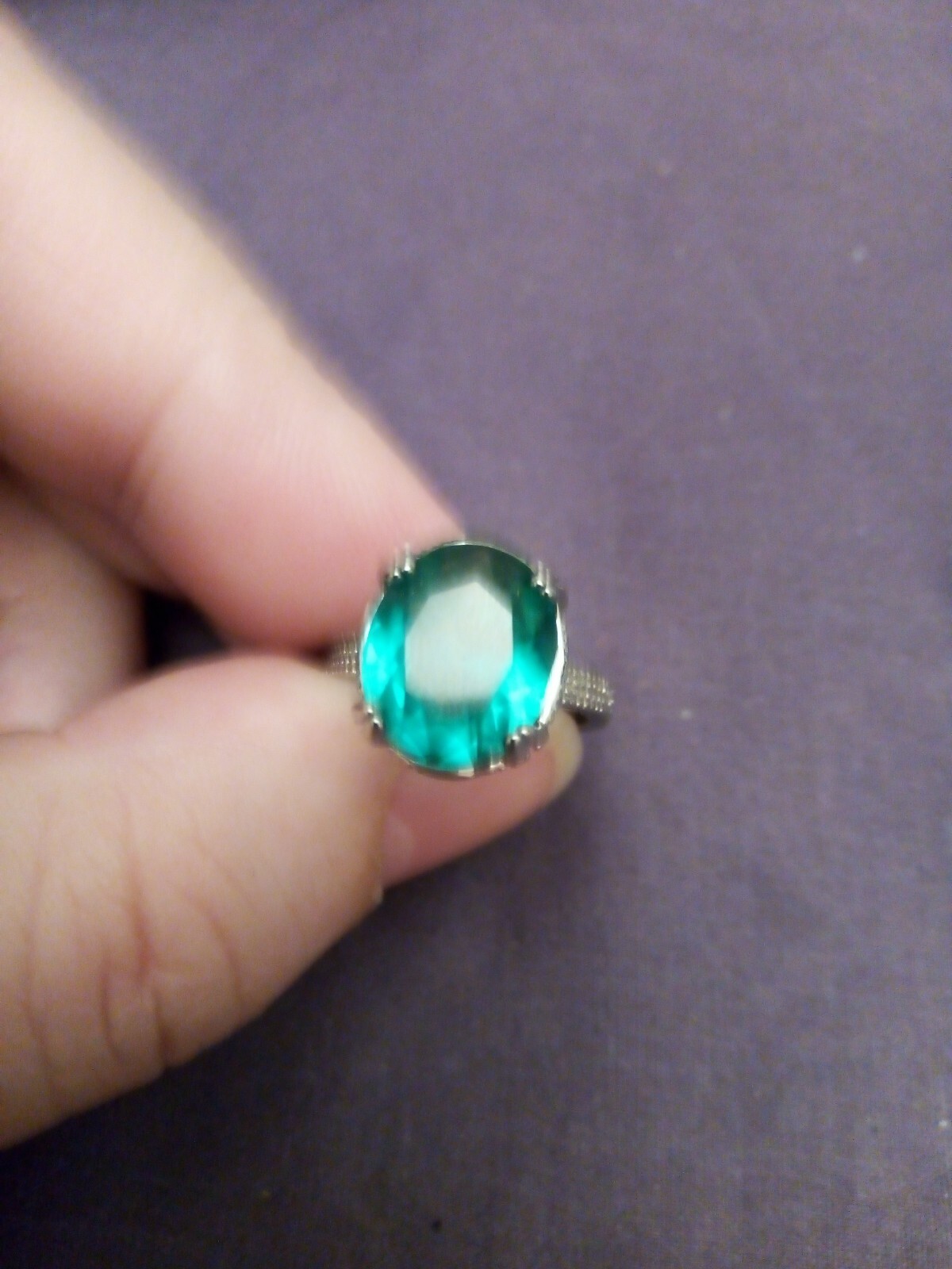 SizeUK J and USA 4.5 Possibly silver ring Green oval cut claw set ring