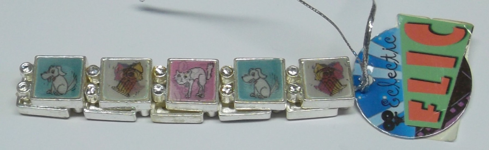 Dog Stretch FLIC Magic Motion Bracelet Changes Picture When Moved Silver Pl NEW