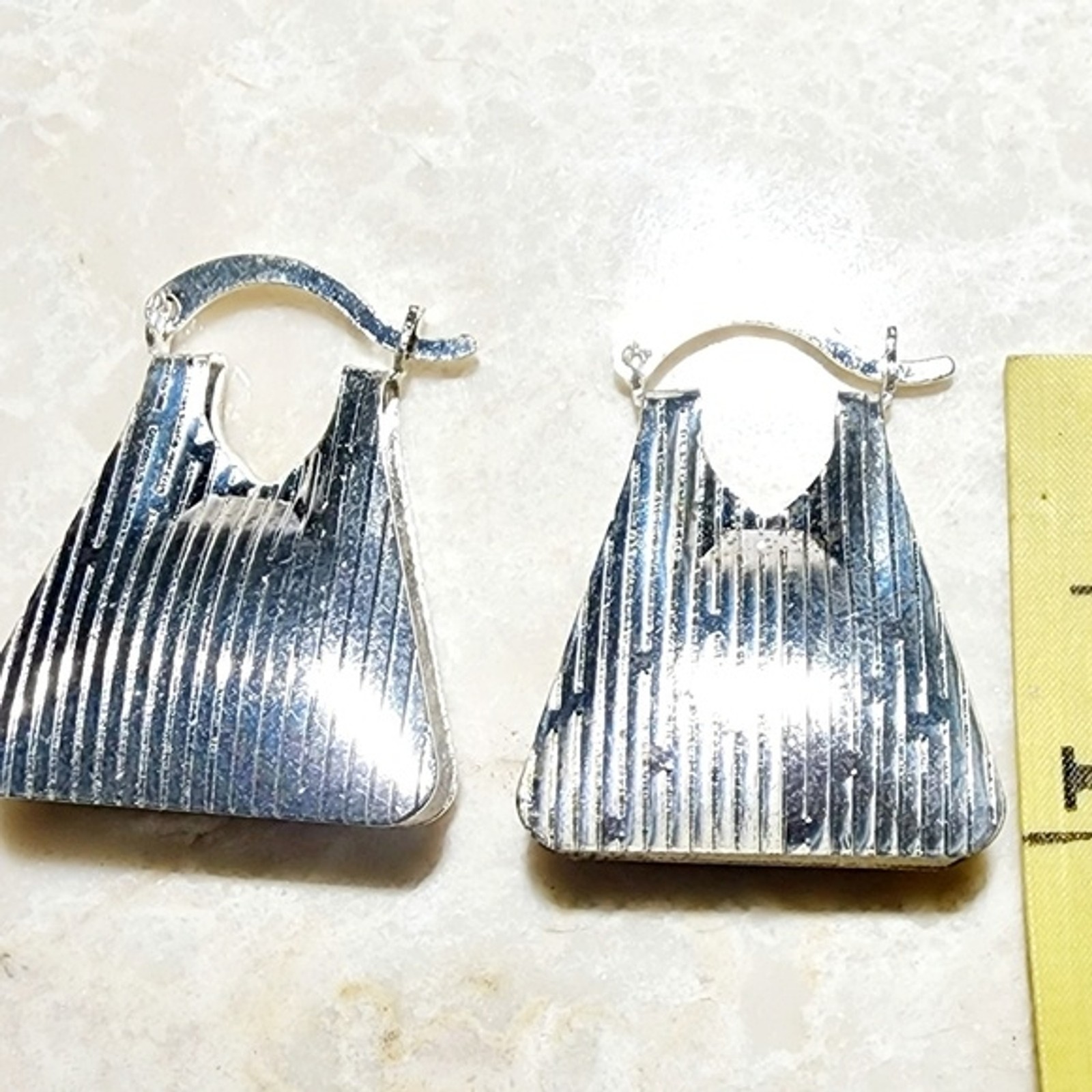 Bright Silver lightweight clasp tote designed earrings