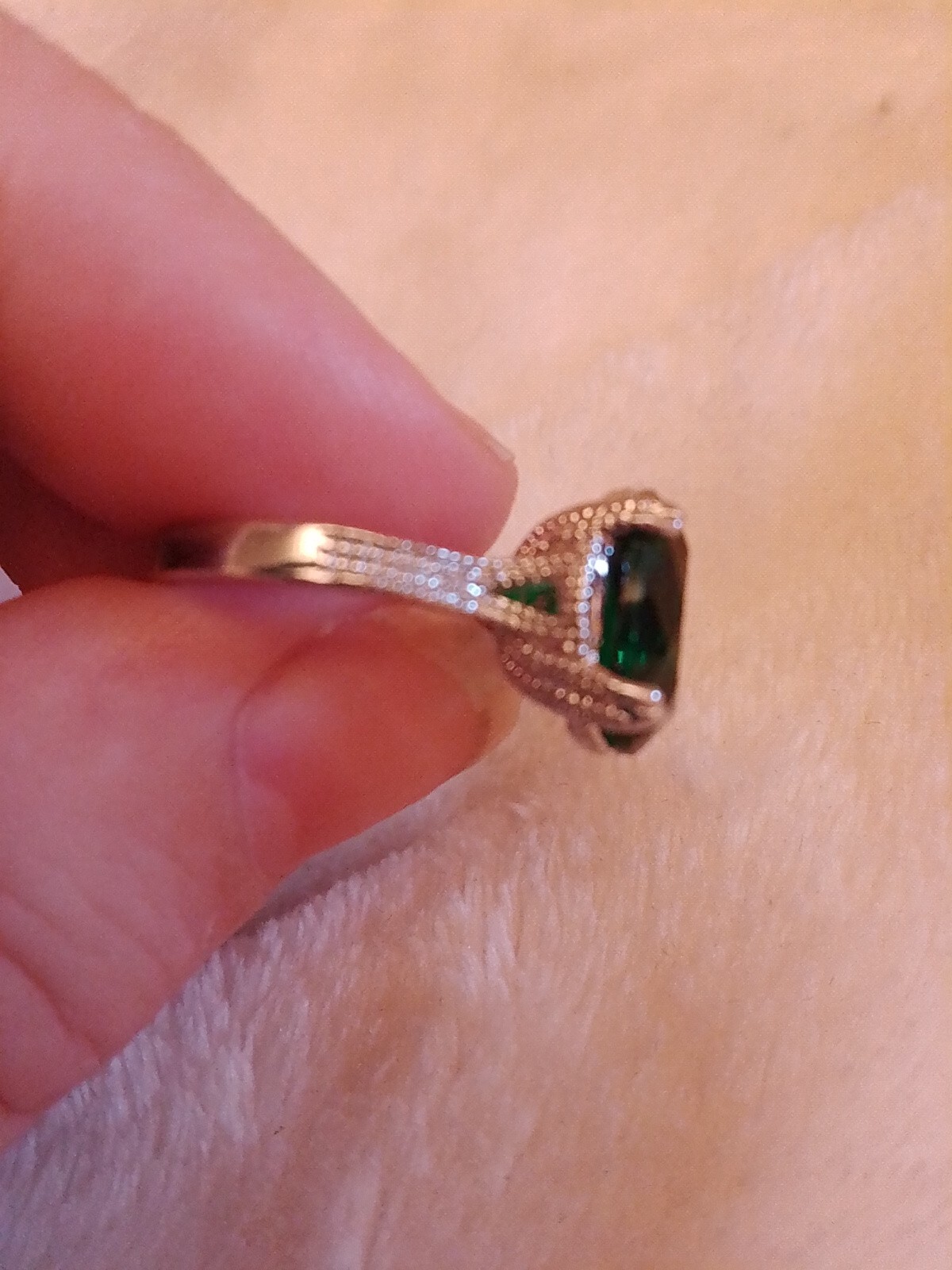 SizeUK J and USA 4.5 Possibly silver Green oval cut claw set ring