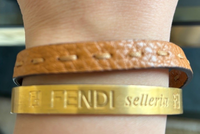 Fendi Gold Plated Interlocking Tan Leather Strap Bracelet With Button Closure