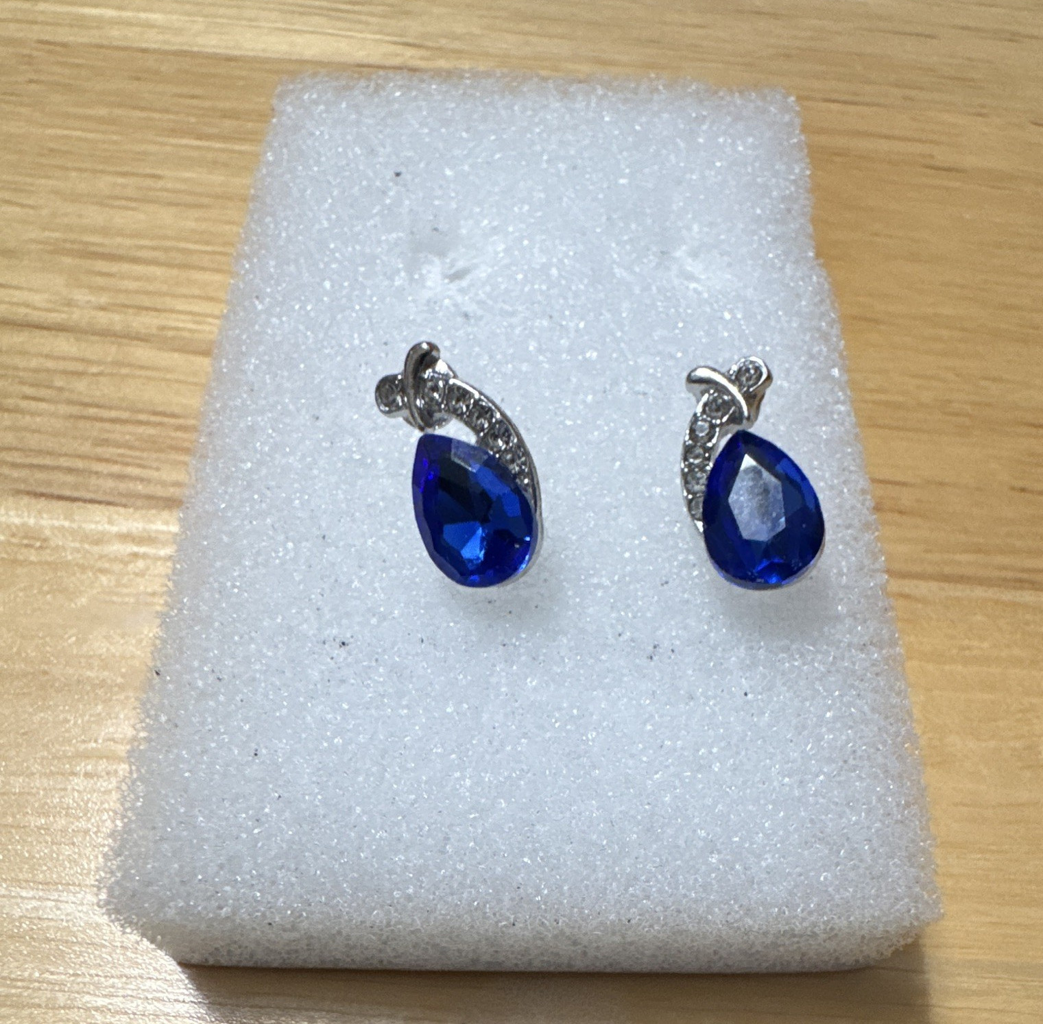 SILVER TONE METAL, BLUE CRYSTAL TEARDROP STUD EARRINGS, BUTTERFLY BACK