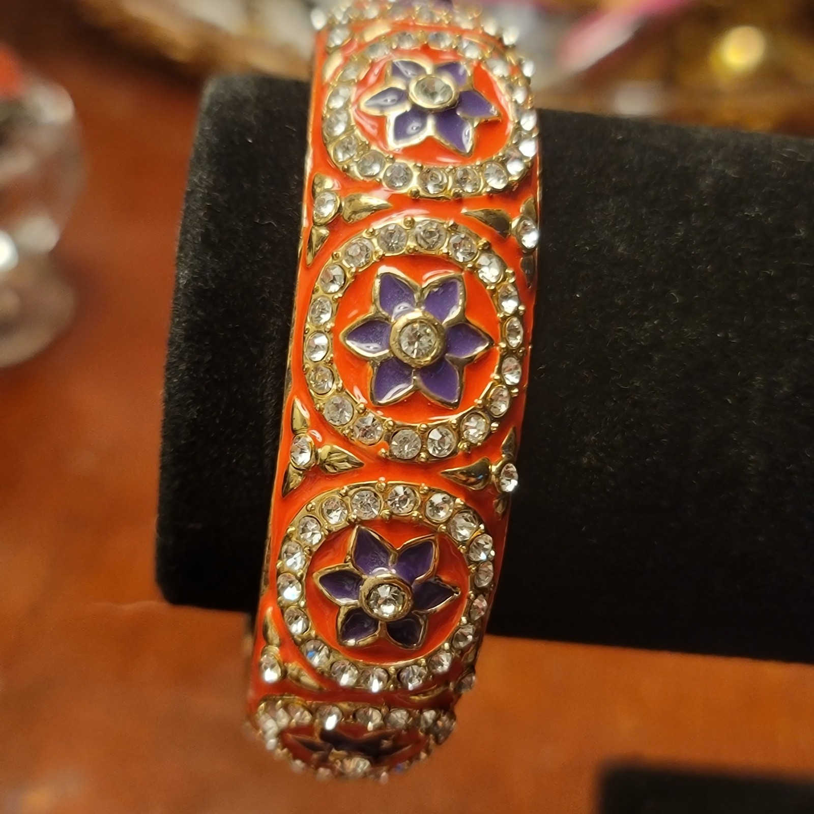 Gold Tone Bangle Bracelet, orange enamel, purple flowers, clear Rhinestones