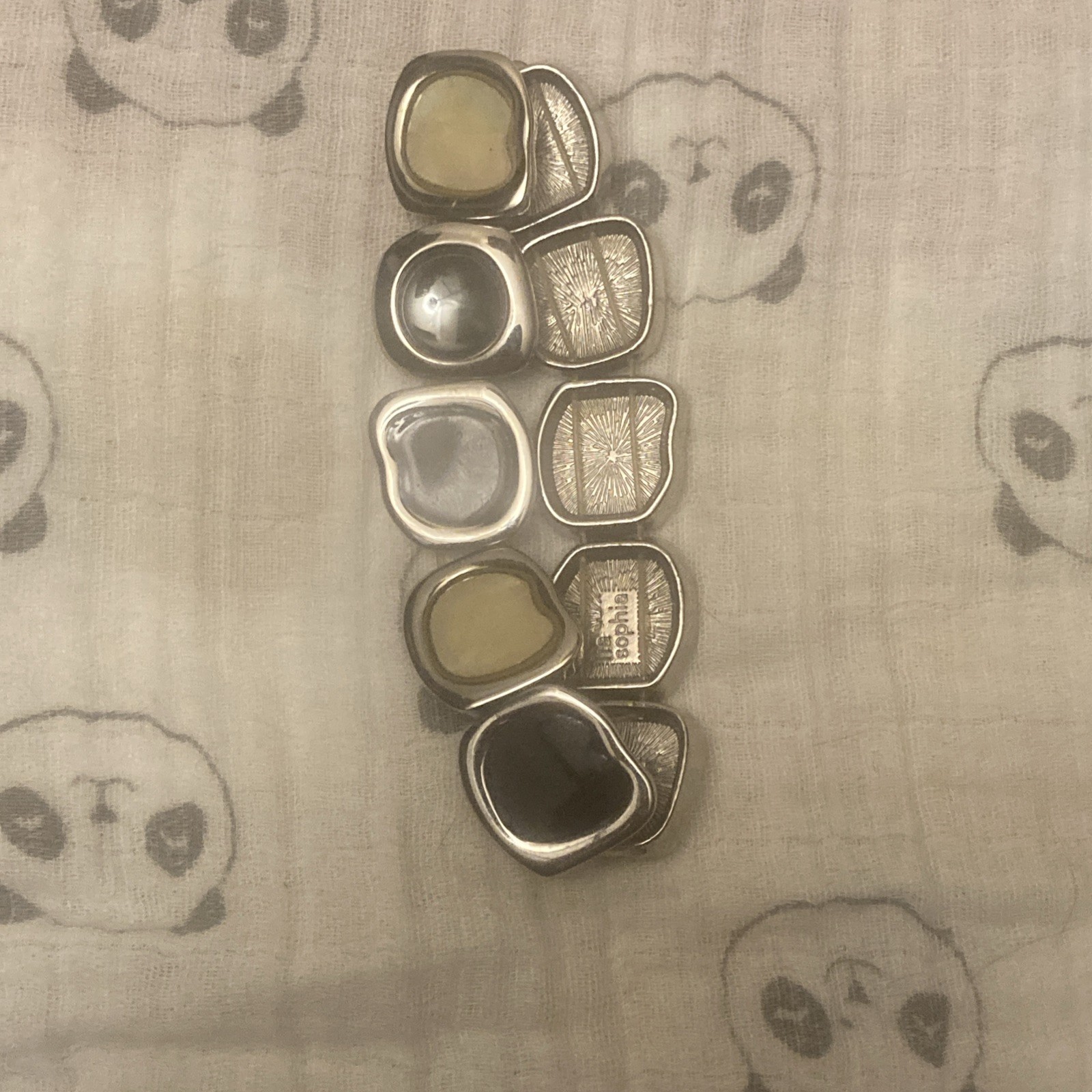 Lia Sophia Ivory and Black Enamel Stretchy Bracelet Silver Tone