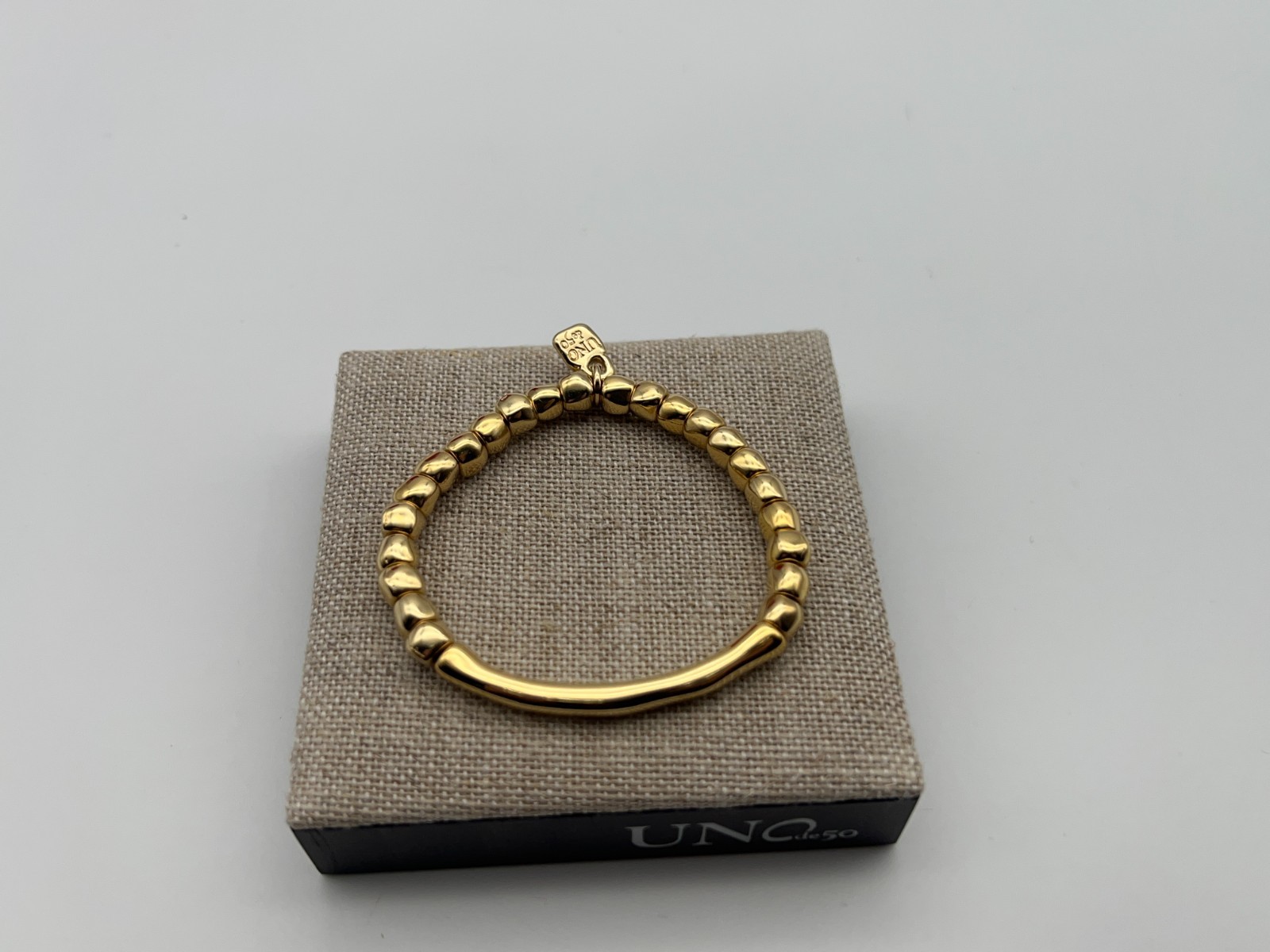 NEW Uno de 50 JOURNEY 18K Gold Plated Stretch Bracelet Tubular Piece Medium