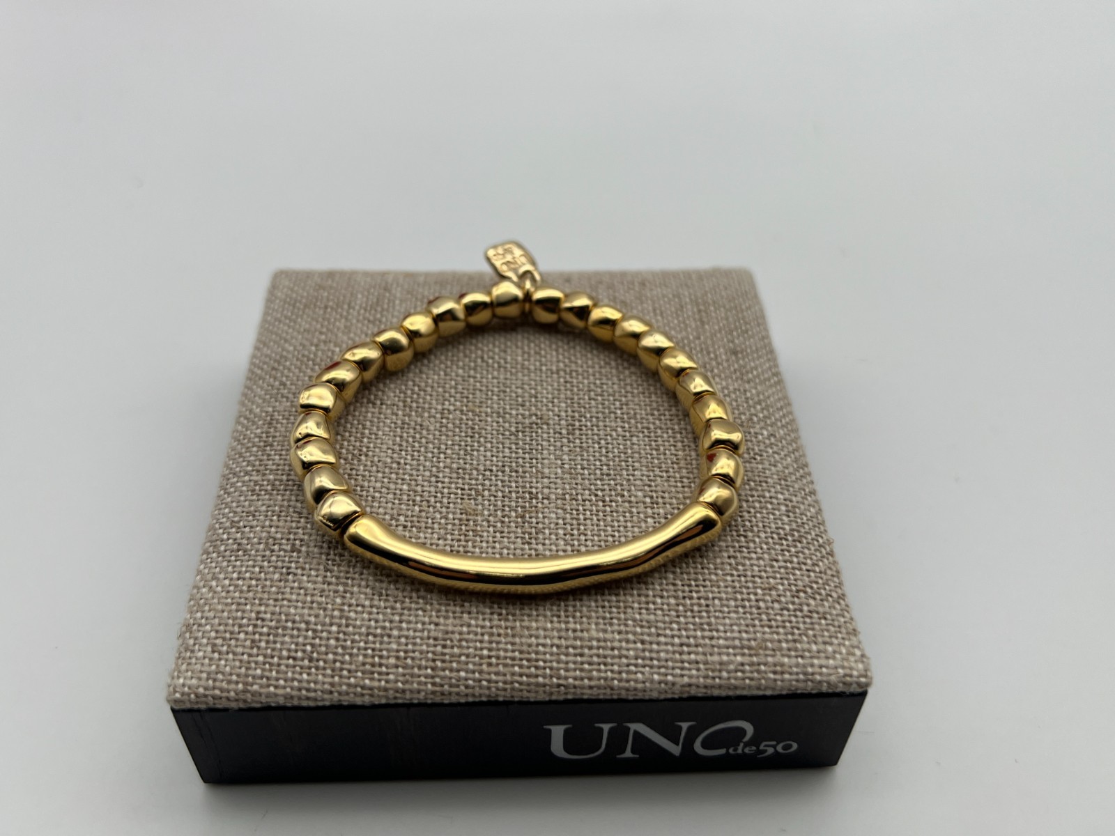 NEW Uno de 50 JOURNEY 18K Gold Plated Stretch Bracelet Tubular Piece Medium