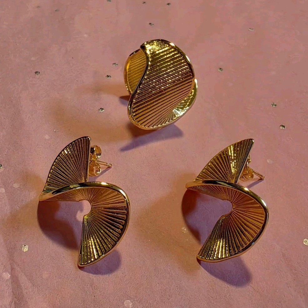 Gold Stainless Steel Textured Asymmetrical Stud Earrings And Ring Set.