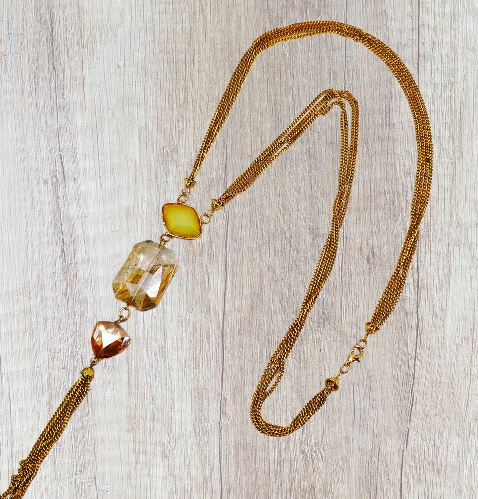 Gold tassel chain pendant necklace with glass beads in beige and light orange