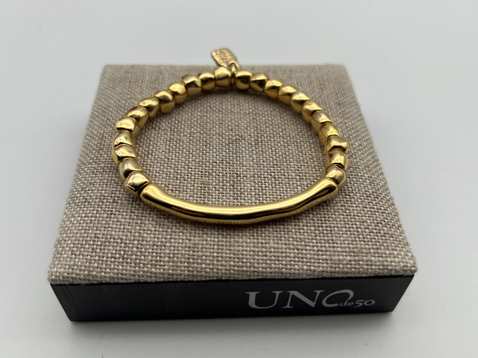 NEW Uno de 50 JOURNEY 18K Gold Plated Stretch Bracelet Tubular Piece Medium