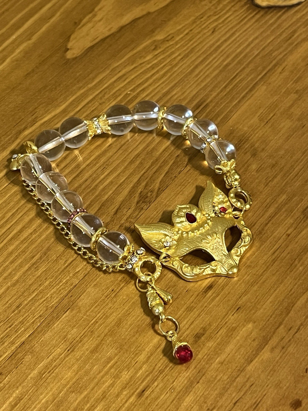 Spirit fox mask design stretch bracelet gold tone chain clear beads dangle charm