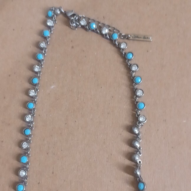 Allison Reed Silver Tone Faux Turquoise Rhinestone Dangle Necklace. Features
